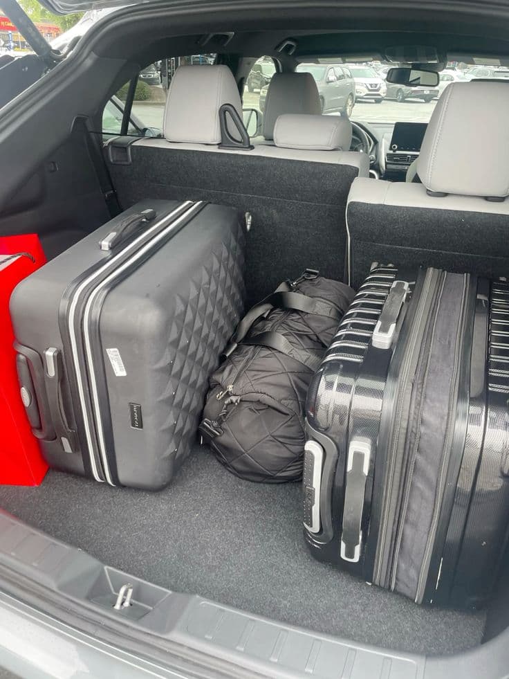Delivery vehicle loaded with parcels and luggage ready for dispatch